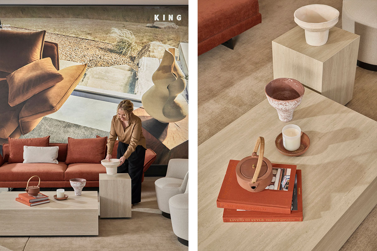 Rectangular ceramic coffee and side tables are paired together creating an architectural effect, styled with a sofa in a warm spice.