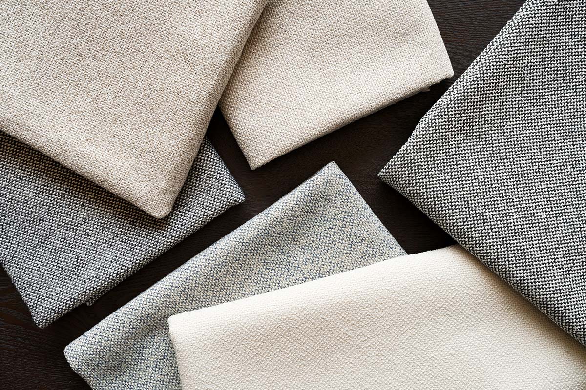 Folded neutral fabrics artfully arranged